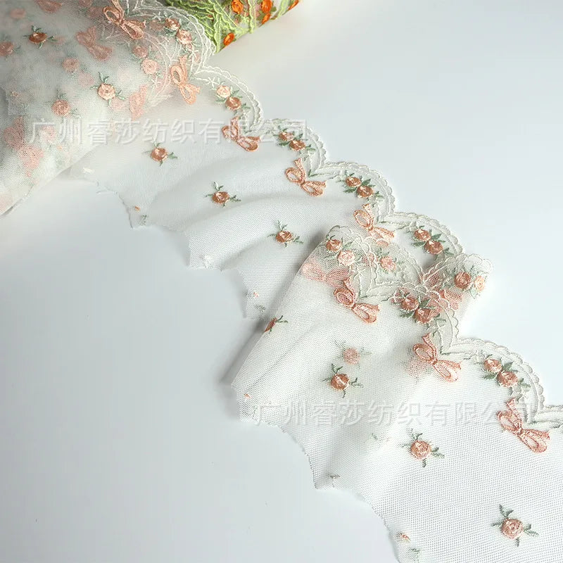 tissu polyester dentelle broderie fleurs rubans bordure élégant blanc orange vertclair 11cm 3mètres translucent