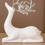 décorations modernes deux cerfs noirs blancs sphères verre transparentes bulles