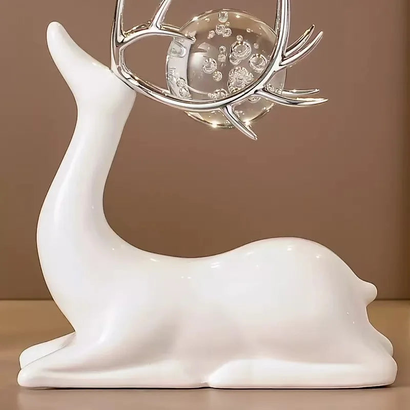 décorations modernes deux cerfs noirs blancs sphères verre transparentes bulles