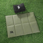 coussin pliable assise imperméable vert olive noir tissu micro perforé pratique portable camping pêche