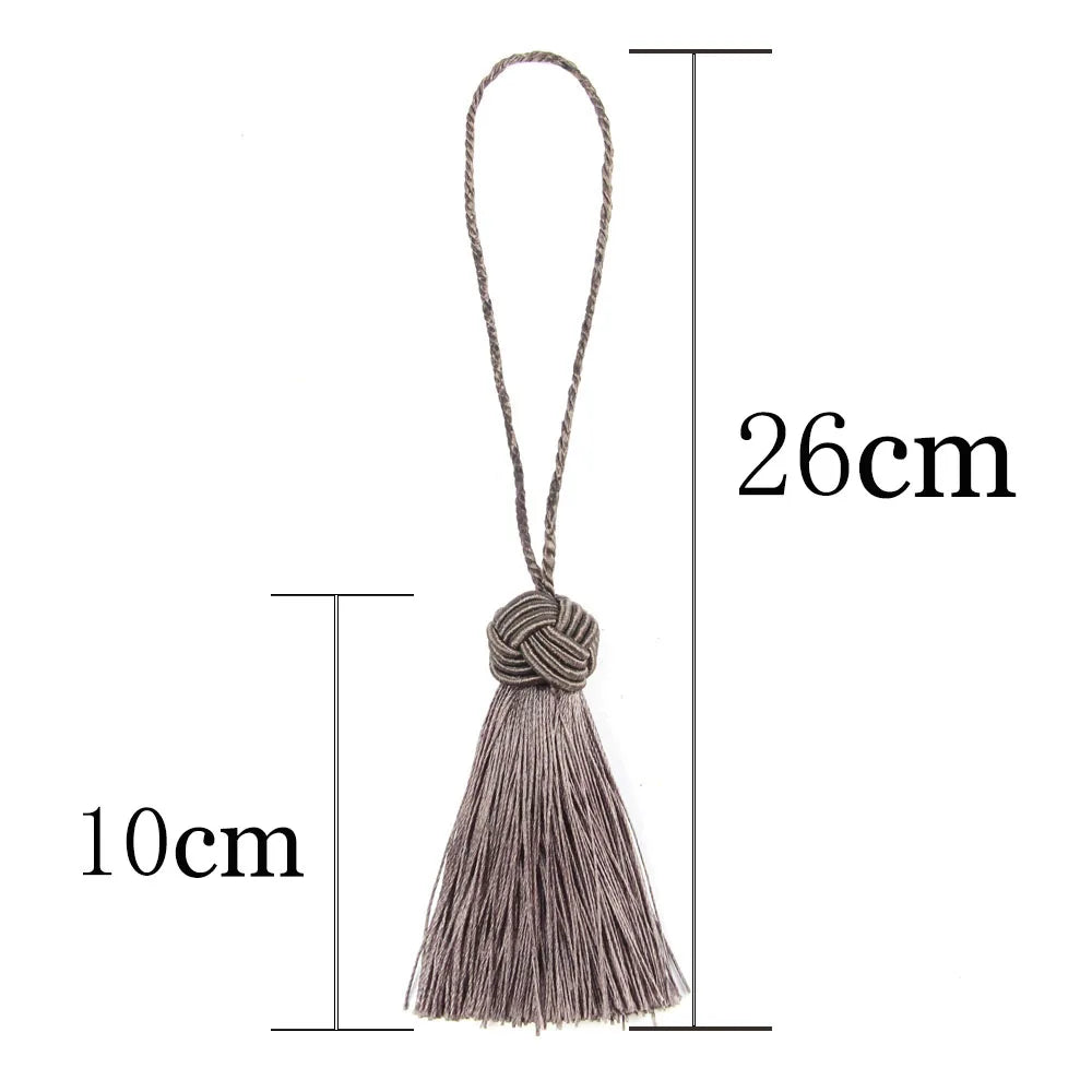 pompons franges decoration maison beige gris blanc bleu marine noir tissu élégant