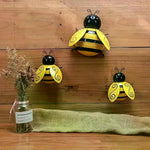 décoration extérieure abeille artisanale jaune noire rayures patio jardin pendaison métal fleuri
