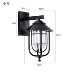 lampe murale vintage industrielle cage métallique verre transparent noir fixée mur plaque fixation