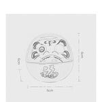 décoration table céramique daruma dolls visage stylisé motifs floraux traditionnel japonais couleur rose bleu