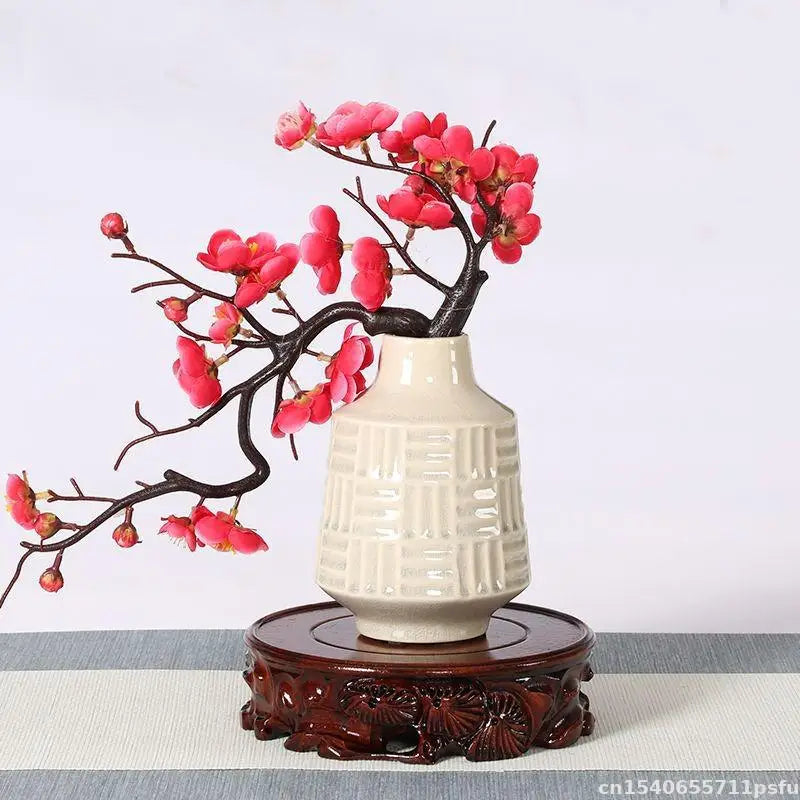 support bois sculpté marron foncé socle décoratif artisanal vase objet d'art