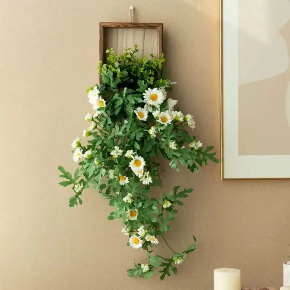 décoration murale plante artificielle suspendue fleurs blanches feuilles vertes crochet mural moderne minimalisteintérieur ambiance