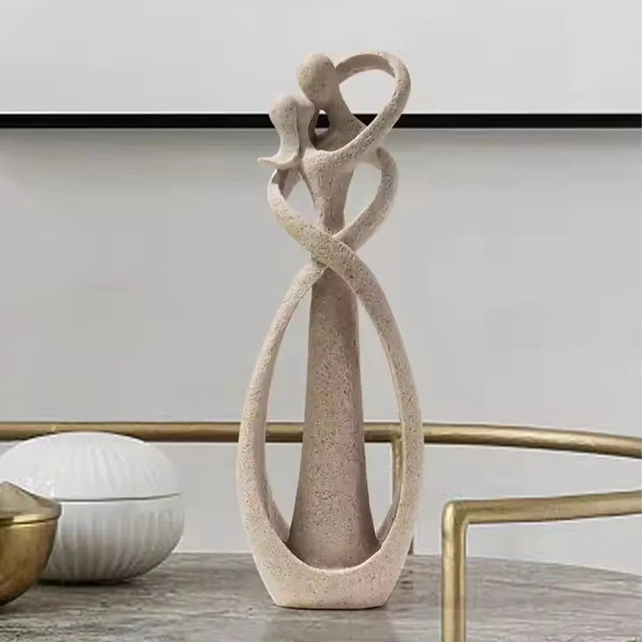 sculpture couple enlacé résine beige or moderne décoration intérieure nordique abstraite minimaliste table salon