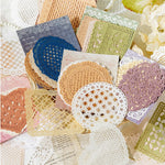 serviettes table papier découpé motifs floraux vintage blanc beige bleu vert rose marron clair