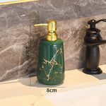 ensemble porte brosse dents porte savon marbre moderne or noir élégant bouteille parfum fleurs