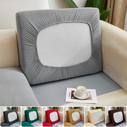 housse coussin extensible protection canapé salon gris beige moderne minimaliste tissu texturé antidérapante amovible