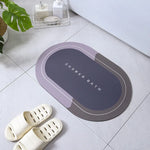 tapis bain moderne ovale motifs pas couleurs bleu marine gris clair rose violet texture