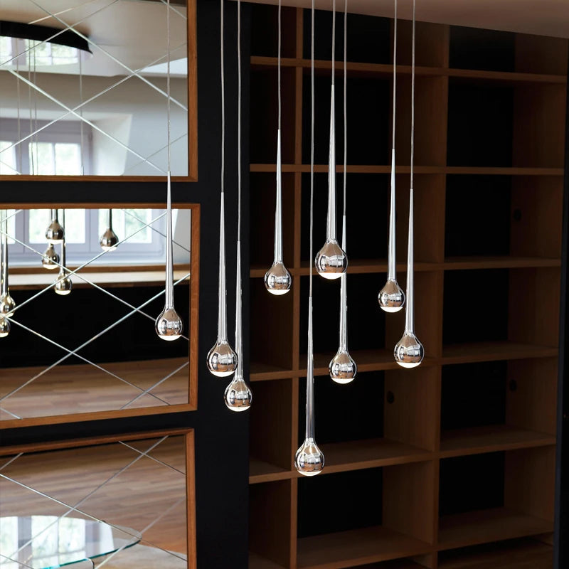 suspension lumineuse argentée gouttes pluie contemporaine fil 2000 82000 lumens chambre salon étude