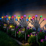 éclairage paysager solaire led moderne boules lumineuses colorées branches métalliques fixation tige terreextérieur nocturne
