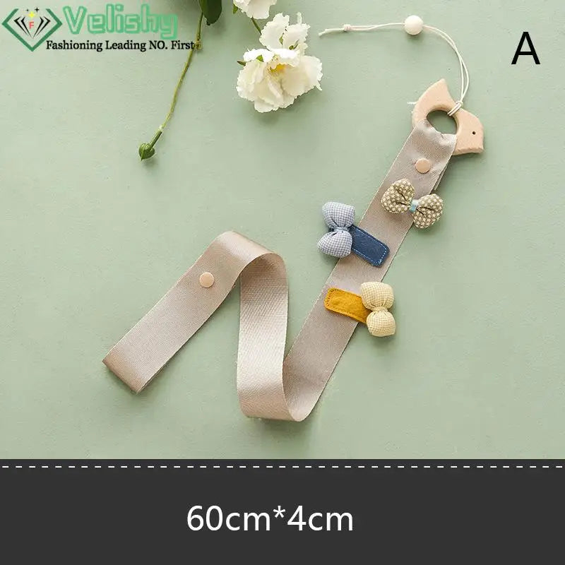 porte accessoires mural moderne rubans clips cheveux motifs floraux pois arc ciel nuages papillons