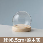 boule verre transparent socle bois décoration d'intérieur moderne objet d'exposition moderne