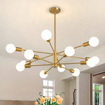 lustre moderne 10 ampoules doré noir chrome sphères blanches structure métallique scandinave