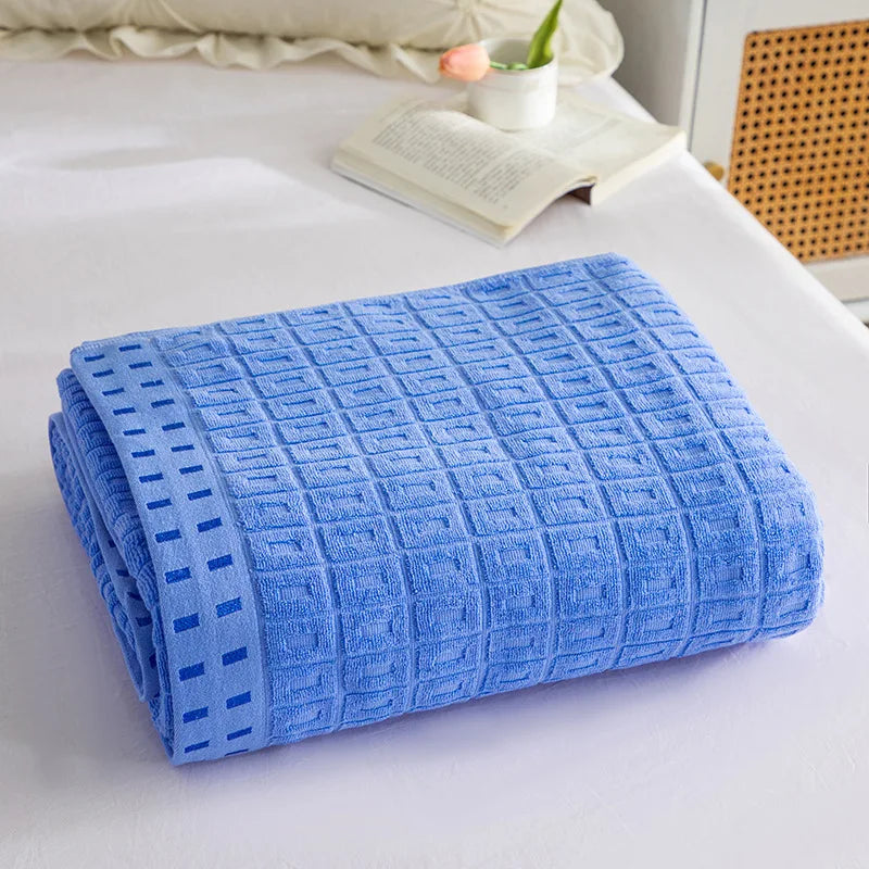 couverture coton bleu gris rose moderne plaid motifs carrés bordure texturée été hiver portable