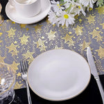 décoration table festif papier étoiles dorées fond gris semi transparent événement anniversaire mariage