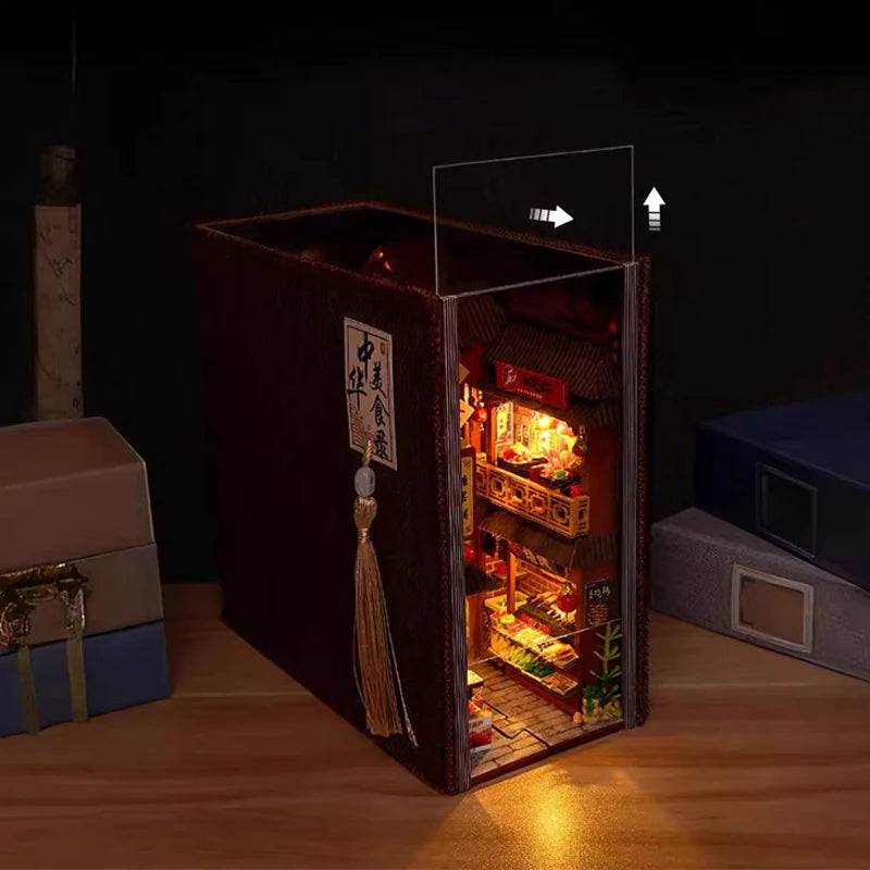 miniature asiatique traditionnelle livre étagère rue toits tuiles lanternes caractères chinois nourriture figurines