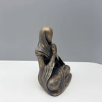 statue décorative méditative résine bronze doré figure assise spirituel abstraite chambre zen yoga