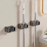 supports mural adhésifs balai pelle noir gris modernes respectueux environnement multiple outils nettoyage cuisine