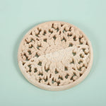Motif floral sculpté sur bois