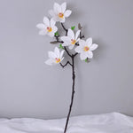 Branche artificielle magnolia fleurs simples feuilles vertes blanc rose jaune verte decoration intérieur