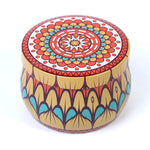 boîtes rondes métal multicolores motifs floraux géométriques boho chic décoration maison