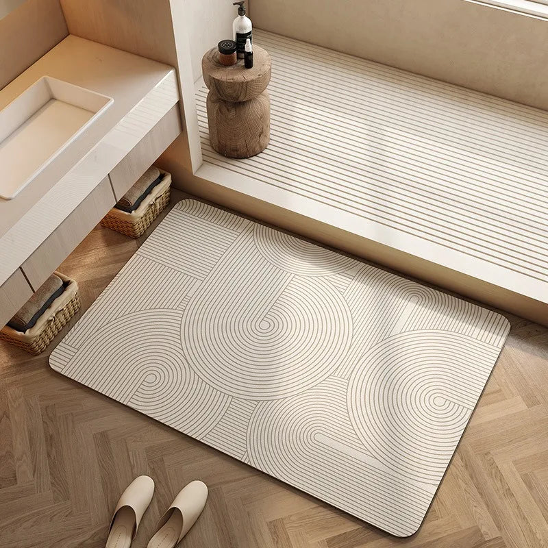 Un tapis de sol de salle de bain en motifs de cercles blancs et gris dans un beau décor de style moderne.