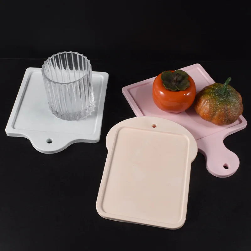 plateau découpant silicone forme pain grillé rose blanc moderne minimaliste alvéolaire transparent accrochage fruits