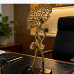 statue décorative moderne danseuse or abstraite texture lisse cheveux ajourés branches élégante
