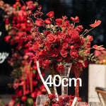 décoration événement mariage anniversaire rose anthuriums dahlia feuillage dense nappe tissu