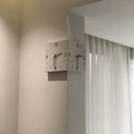 horloge murale moderne cubique aiguille quartz minimaliste couleurs vives opacité totale fixée coin mur