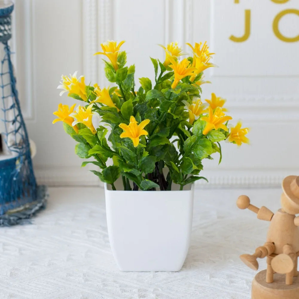 décoration extérieure plante artificielle moderne pot carré blanc branches feuilles vertes fleurs violettes minimalisteextérieur