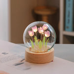veilleuse nuit tulipes rose pâle feuilles vertes base bois transparent moderne