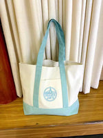 sacs toile colorés blanc vert violet rouge jaune logo trader joes poignées tissu casual