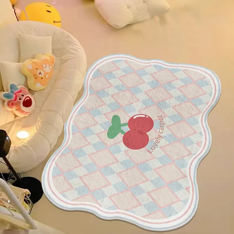 Un tapis décoratif aux motifs géométriques pastel avec un design en forme de goutte d'eau et le logo d'une marque de peluches.