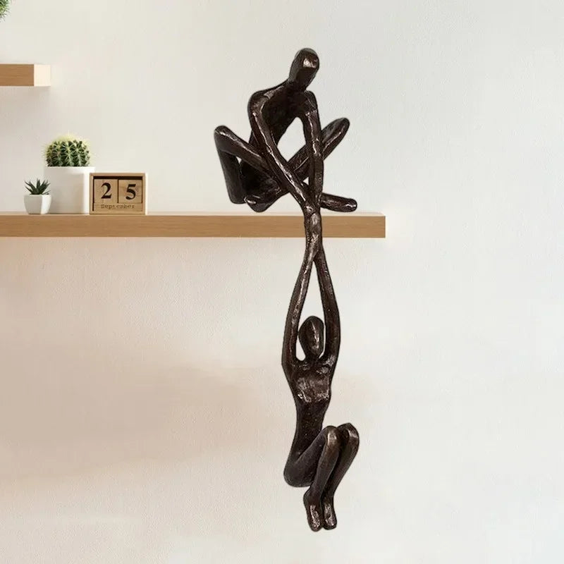 sculpture abstraite moderne deux figures humaines marron foncé pouces large pouces haute éléments decoratifsCALENDRIERplanteVERTEcadrePHOTOARGENTé