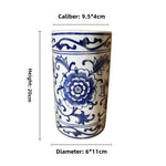 Vase mural avec fleurs séchées
