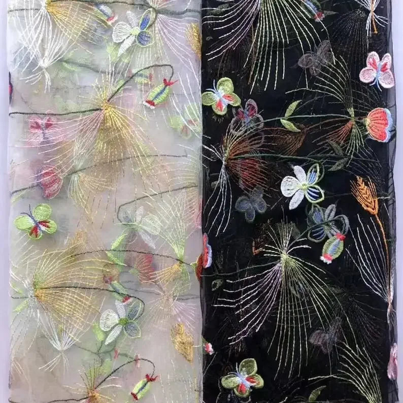 tissu brodé floral papillons couleurs vives transparent fond texturé motifs floraux élégants