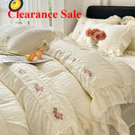 ensemble literie romantique broderies roses volants drap plat oreillers taies d'oreiller couleurs pastel vert