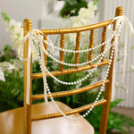 décorations mariage guirlandes satin blanc nacré or chaises allée festive élégantes classicampoises salopes
