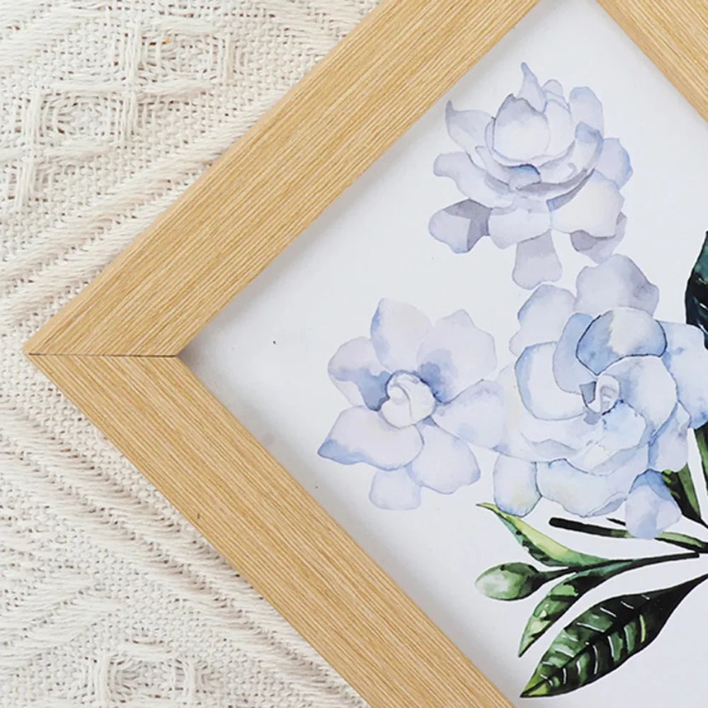 cadre photo bois moderne floral blanc noir cactus palmier fleurs bleues minimaliste mur table