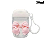 flacon gel hydroalcoolique transparent rose ruban noeud clip moderne rechargeableextérieur