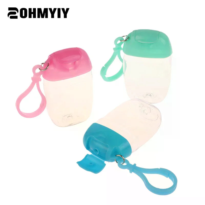 bouteilles rechargeables transparentes modernes couleurs variées anneau boucle pratique portables cosmétiques désinfectant main