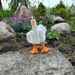 statue canard doigt levé résine blanche orange humour provocateur jardin intérieur decoration art maison