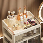 boîtes rangement cosmétiques moderne pliables beige clair poignées dorées étiquettes produits
