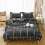 ensemble literie moderne noir blanc motif géométrique housse couette oreillers polyester