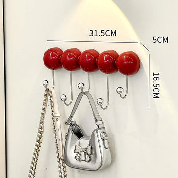 porte sacs mural moderne adhésif sans perçage crochets rouge vert olive sphères brillantes