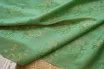 tissu polyester floral semi transparent vert rose motifs dorés traditionnel élégant texturé 145cm